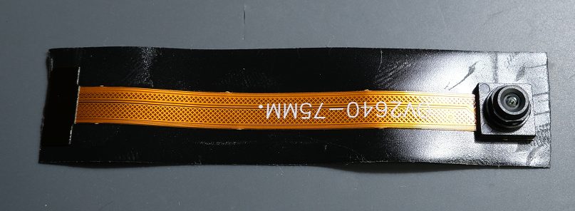 With the tape cut from the roll, lay it down and get out a X-ACTO knife.