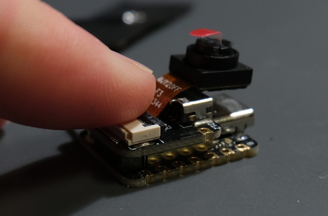 Press down carefully until it snaps on.