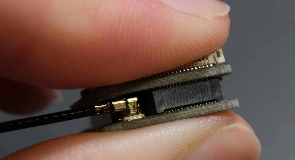 Press down carefully until it snaps on.