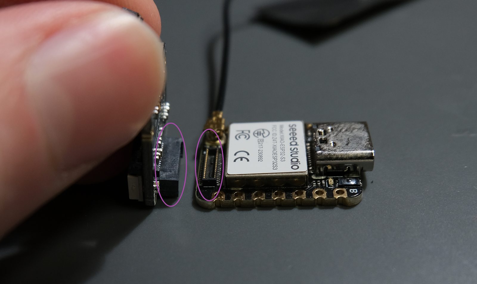 First, locate the connector on the camera hat, and the corresponding one on the XIAO main board circled below.